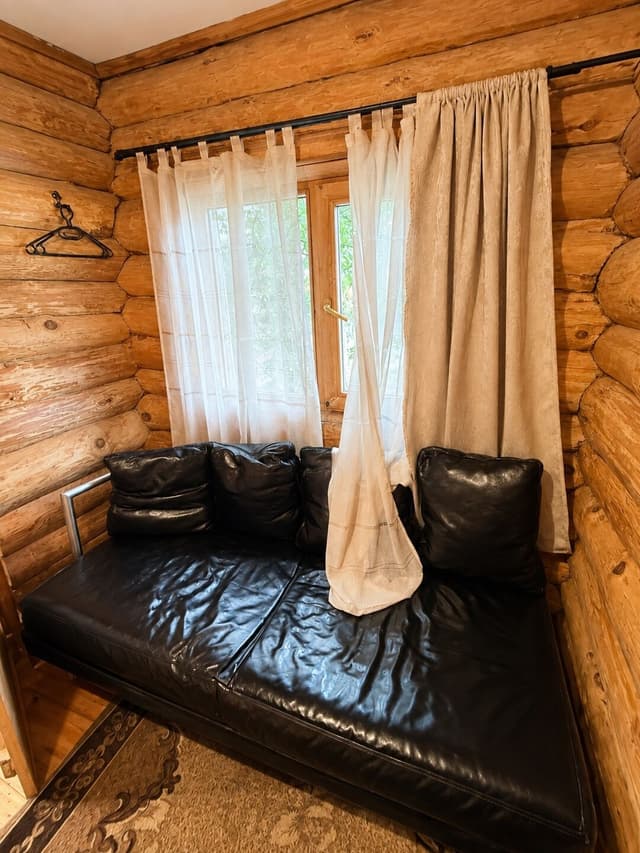 Sofa bed by the window - an extra sleeping place