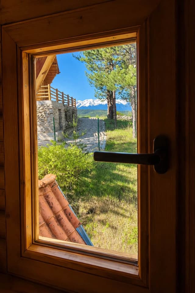 View of a snow-capped Pirin peak from the villa window